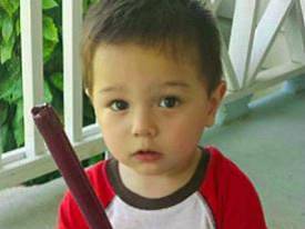 19-month-old Bounkham "Bou Bou" Phonesavanh. Hospitalized for a month after a flashbang grenade exploded in his crib